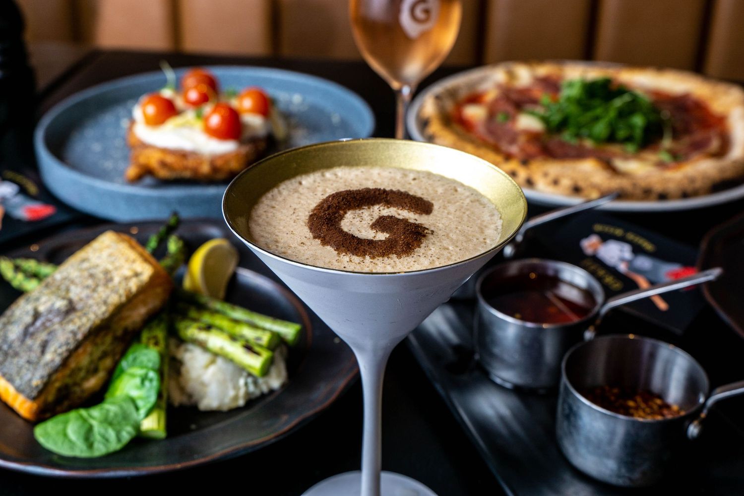400 Gradi Italian espresso martini with food in background