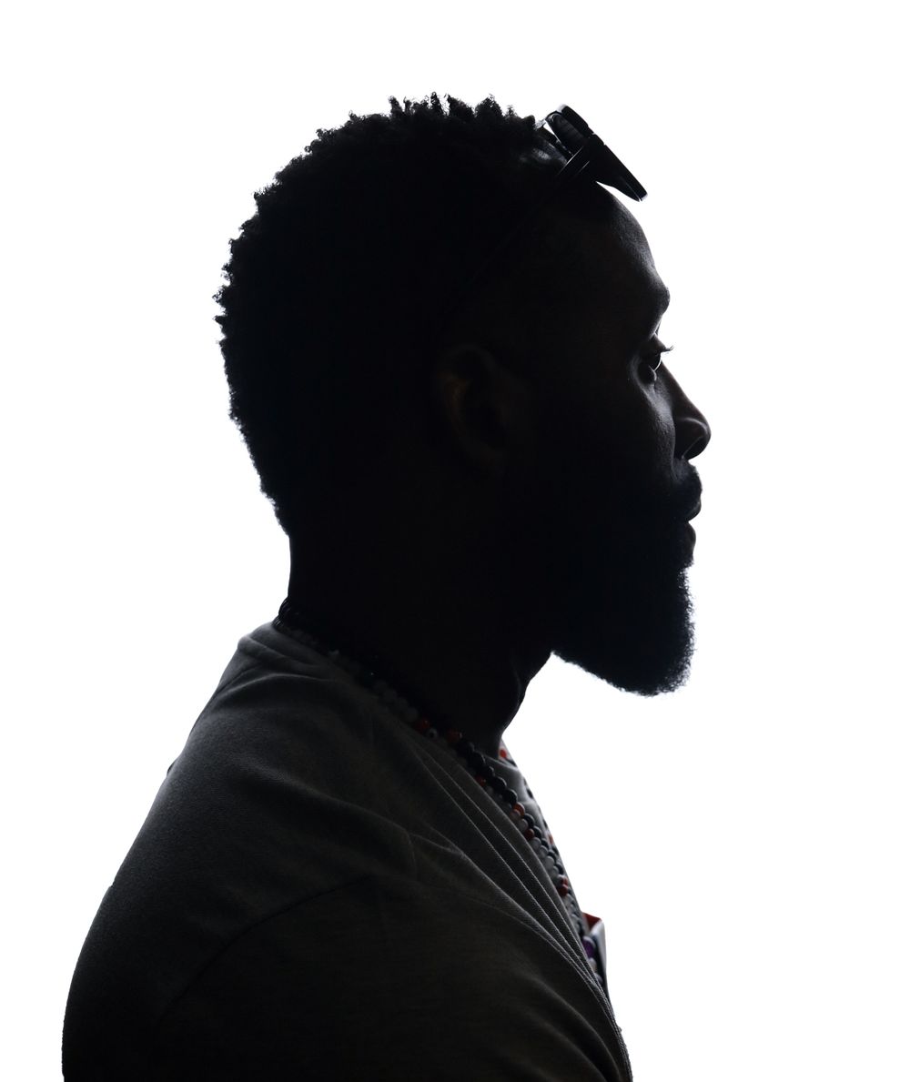 Side profile silhouette portrait against white background showing detailed facial features.