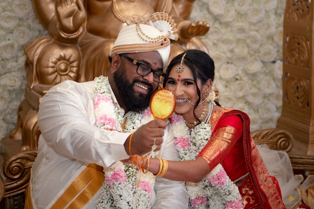 Wedding ceremony with decorative backdrop and cultural festivities.