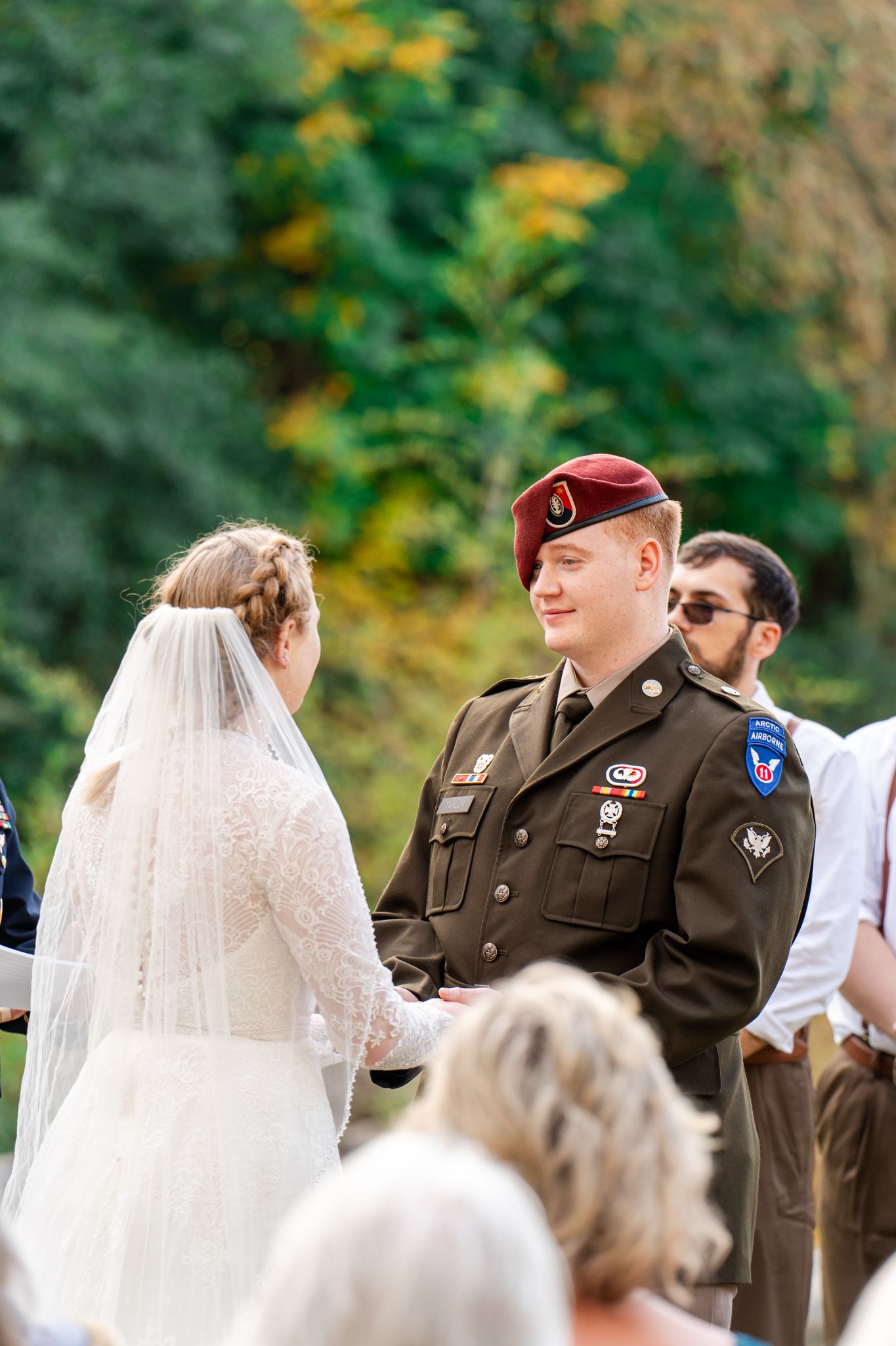 groom looks at bride