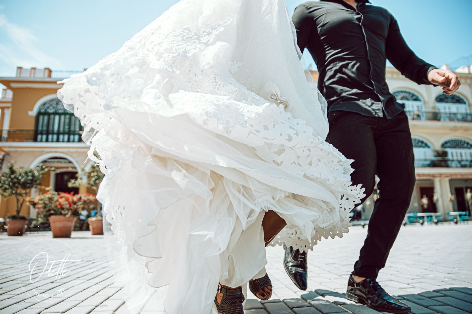 Wedding couple running