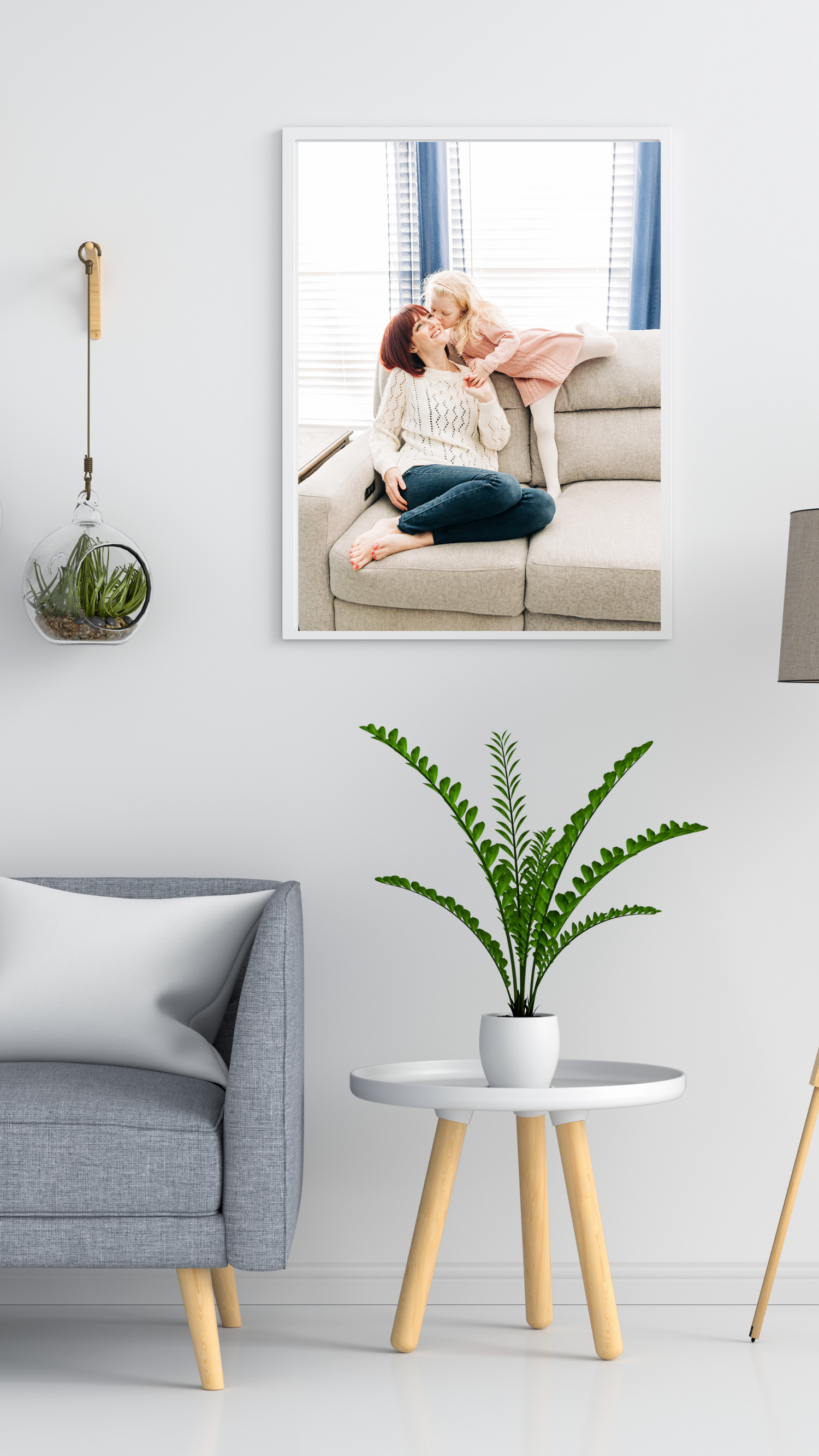photo of a mother and daughter printed and hanging on the wall