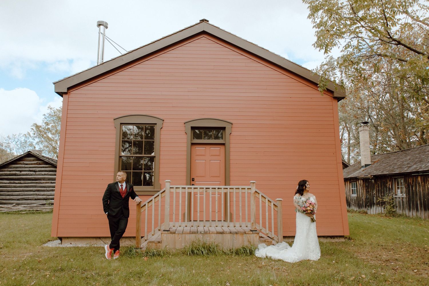 Groom and Bride looking somewhere in front of church