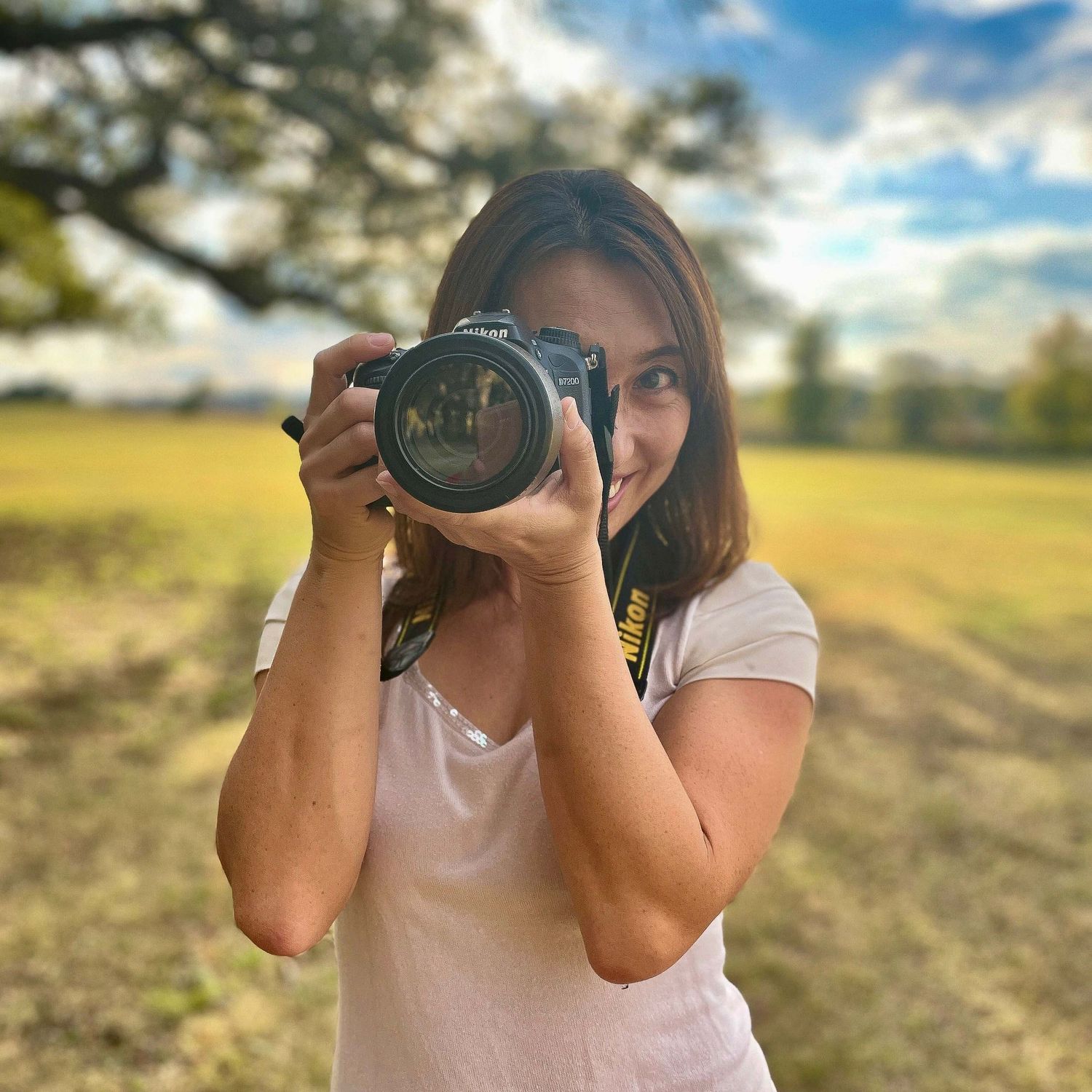 Portrait of a photographer with camera in Round Rock Texas