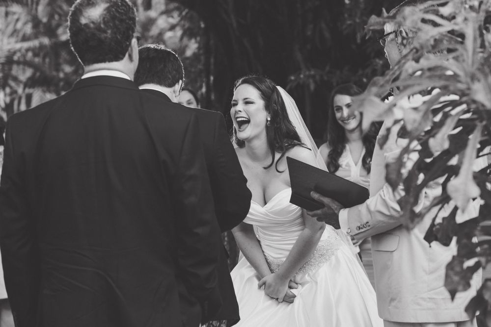 Bride laughing at groom at Bahamas destination wedding with Katy Cook Photography