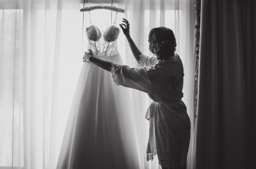 Bride hanging dress at Biltmore Inn in Asheville NC
