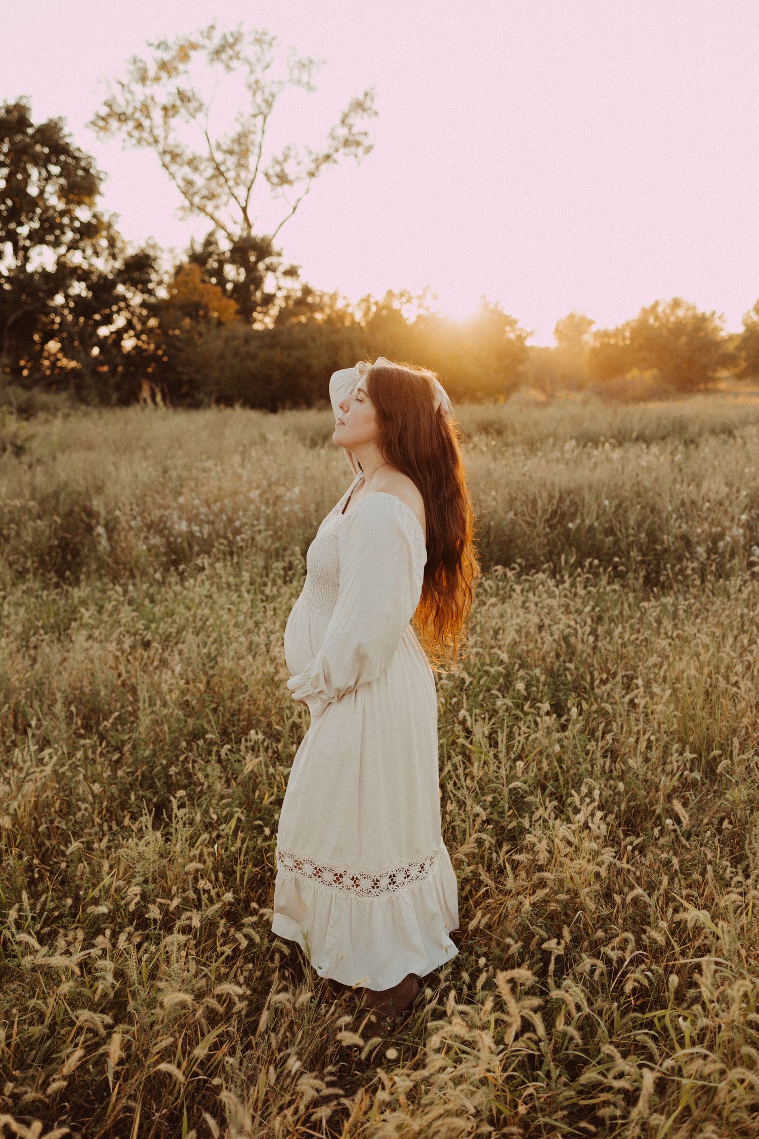 mom feeling beautiful during golden hour maternity photography