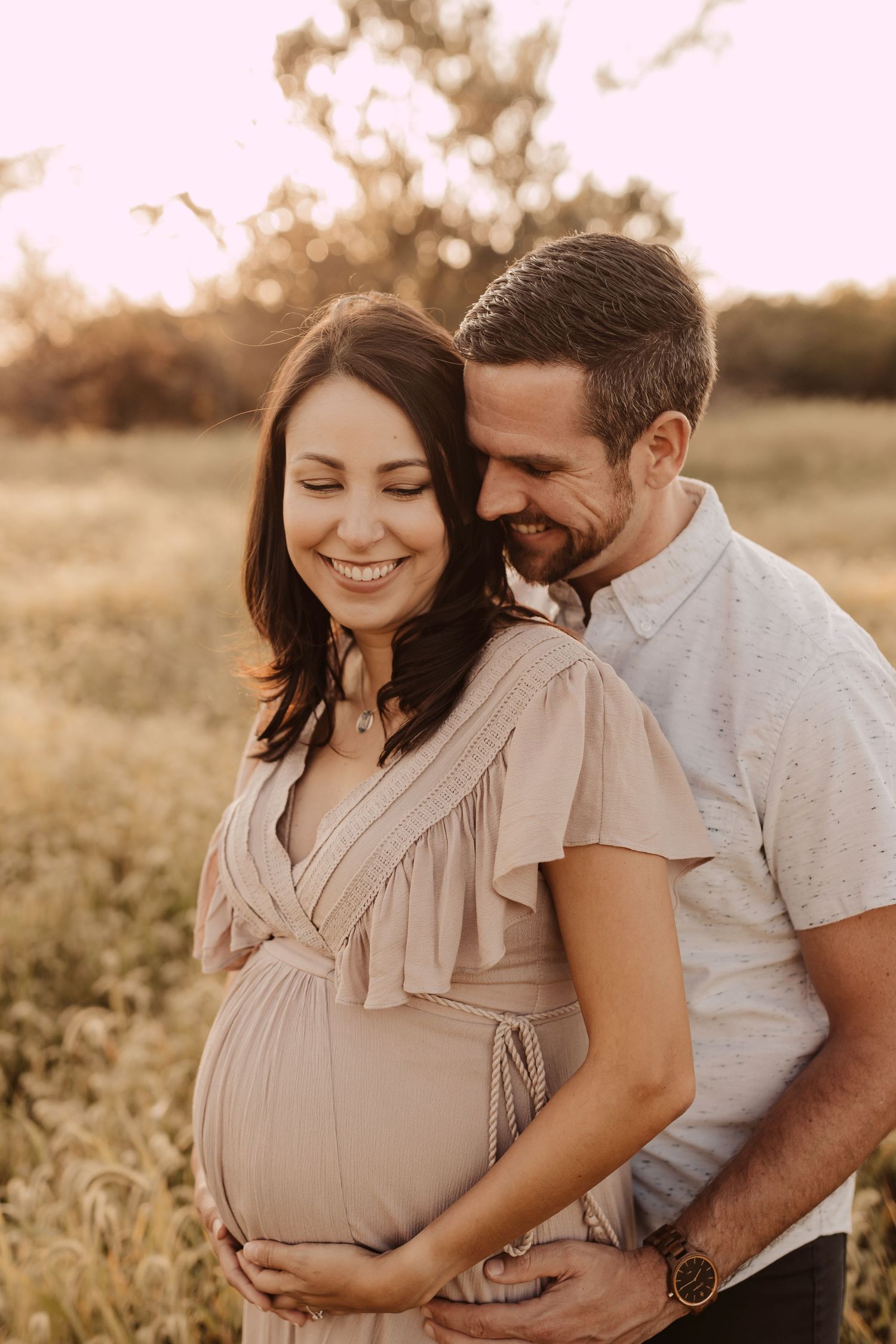 mother and father with a baby bump maternity photography