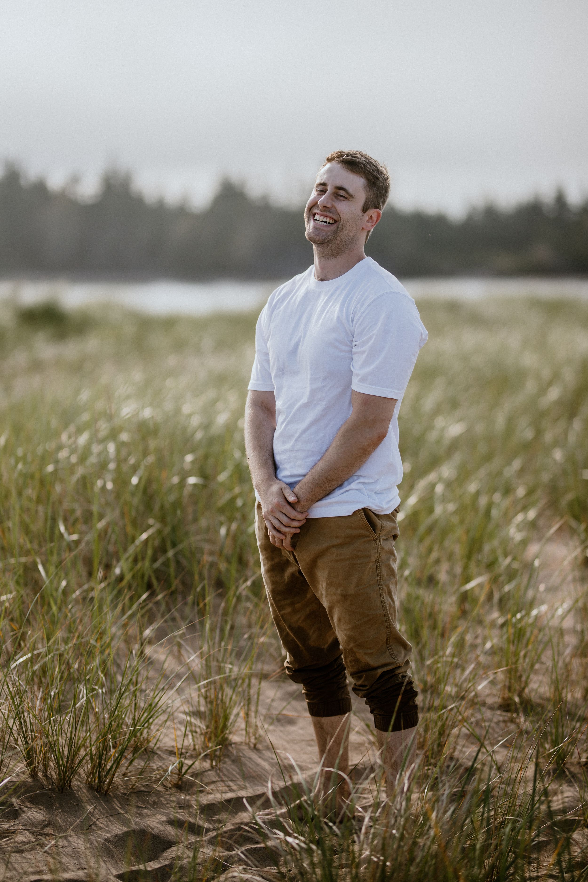Summer engagement session at Lawrencetown Beach Provincial Park outside of Halifax, Nova Scotia
