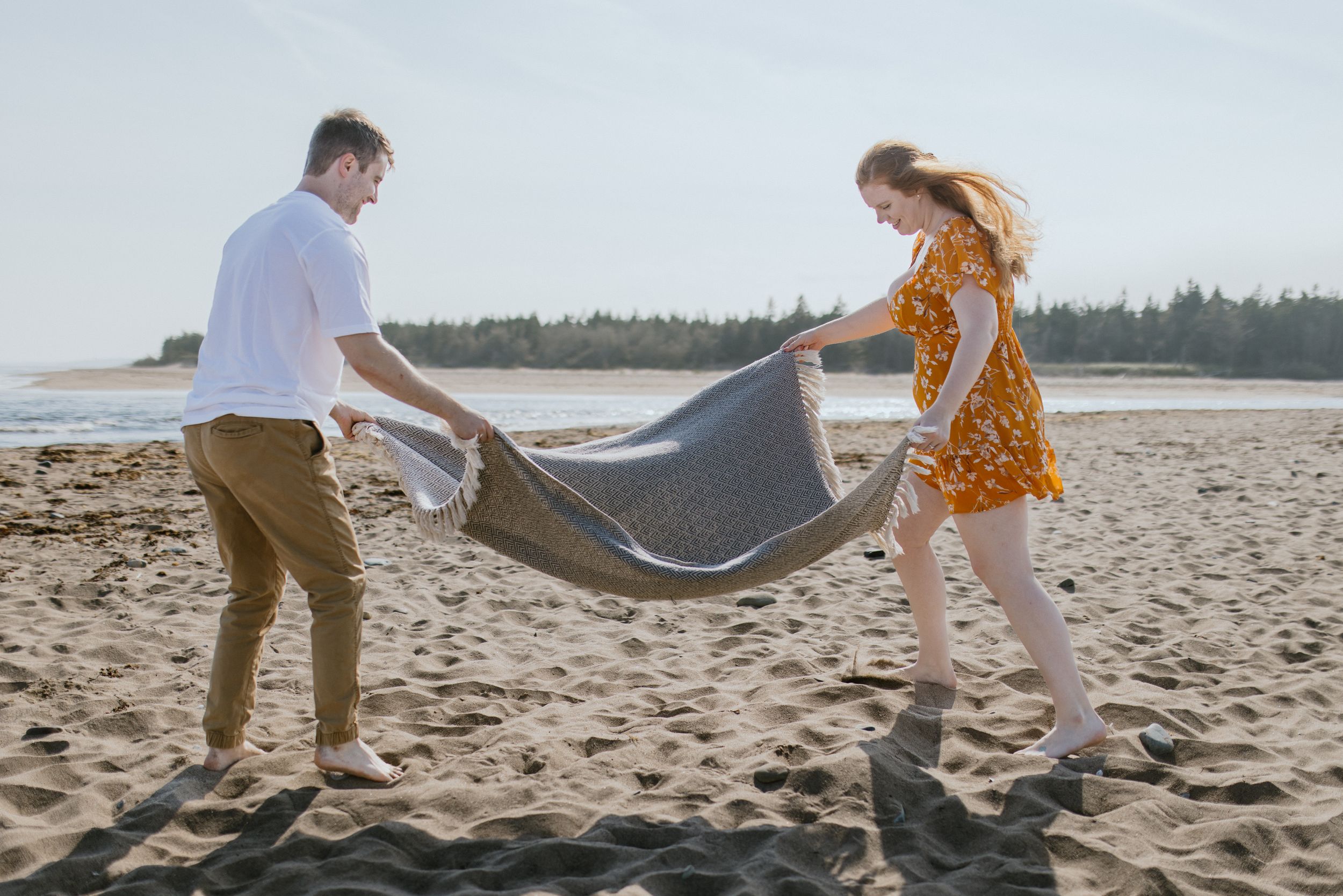 Summer engagement session at Lawrencetown Beach Provincial Park outside of Halifax, Nova Scotia