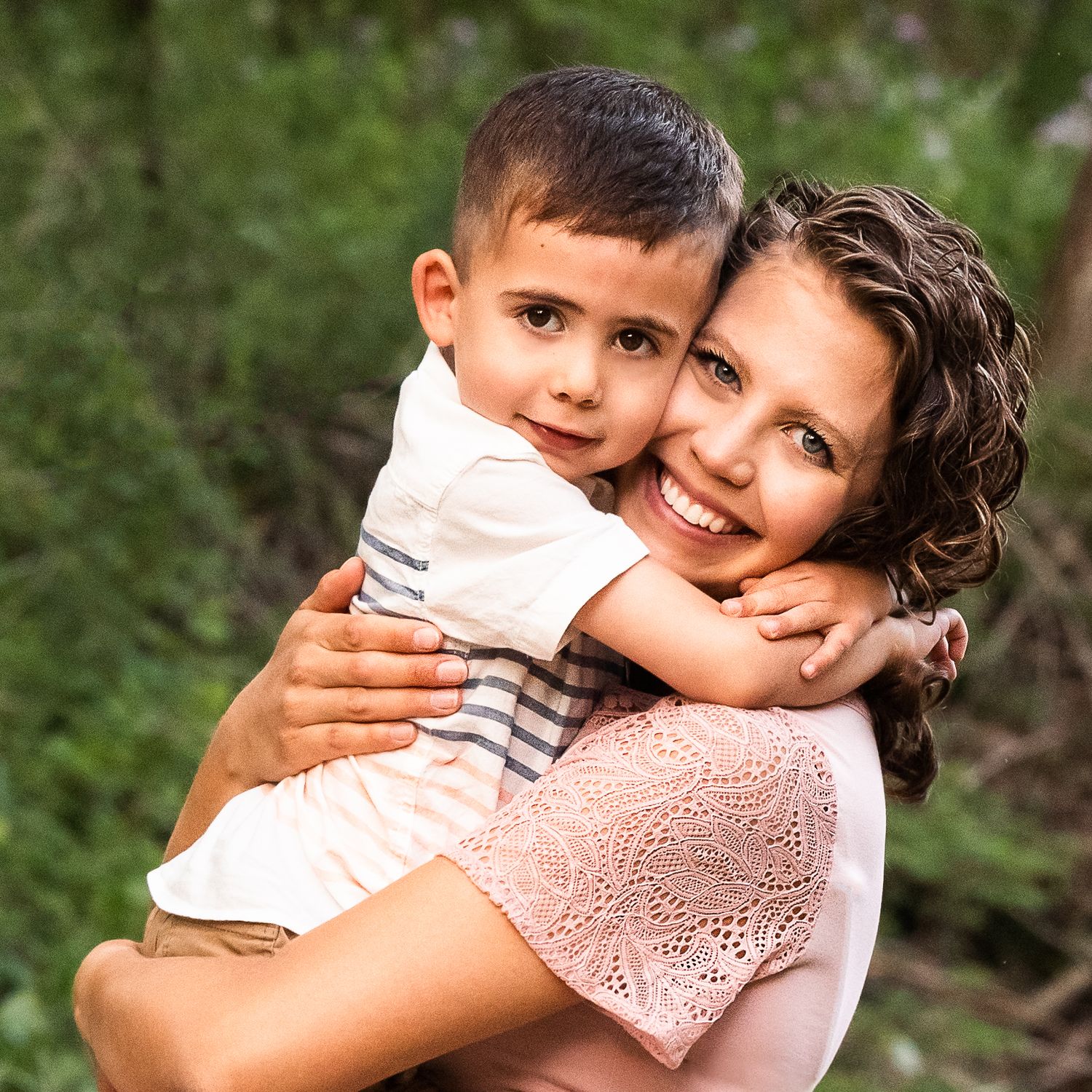 mother son photo session in tight hug