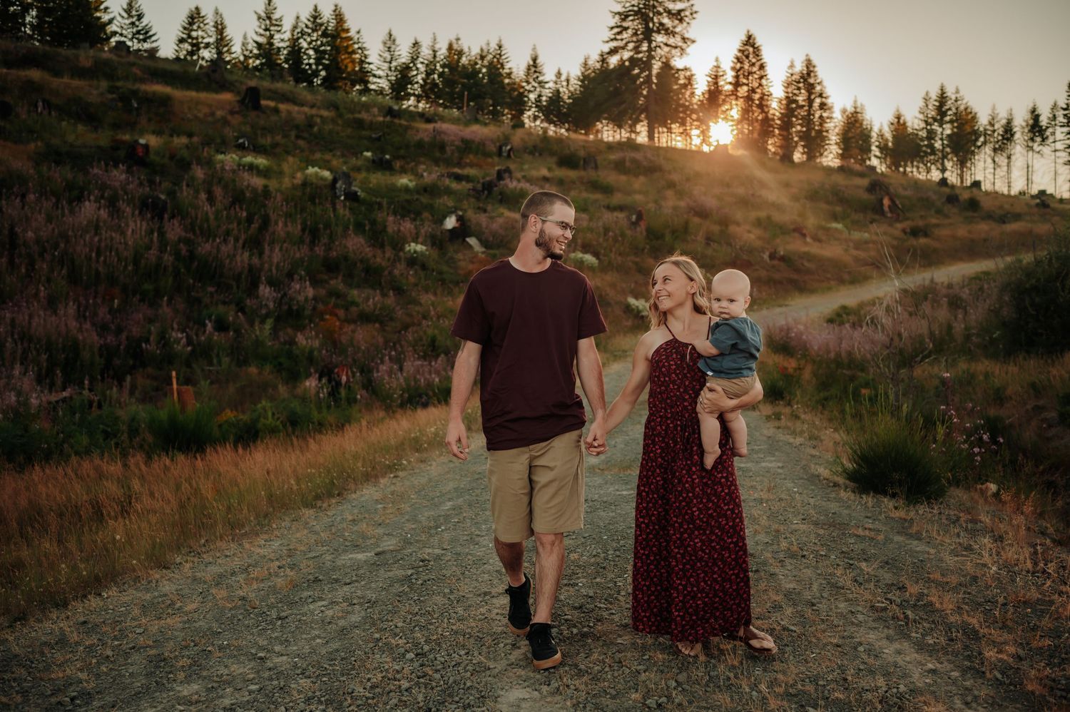 Young family walk down a trail