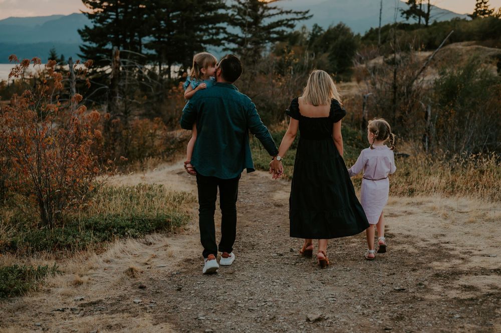 Family walks hand in hand