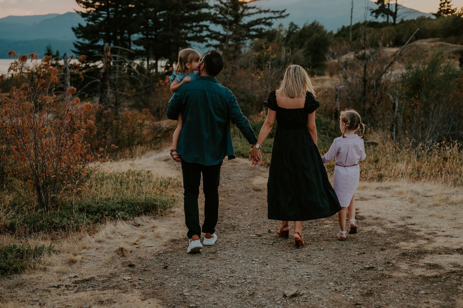 Family walks hand in hand