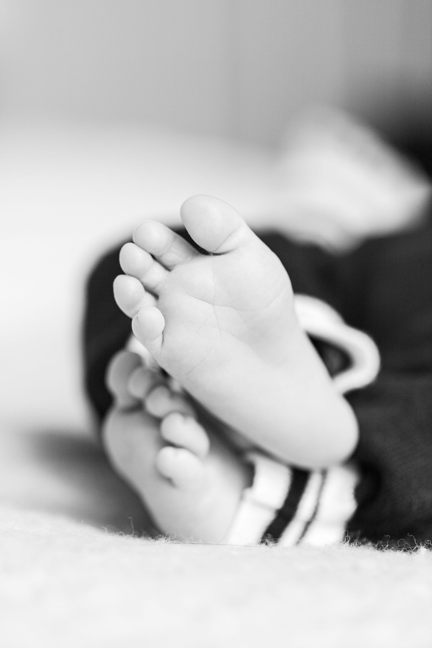 black and white baby feet