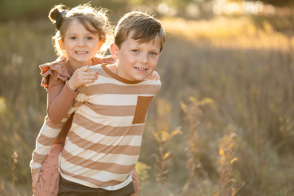 brother and sister, siblings, piggy back ride, family photography, Komoka provincial park