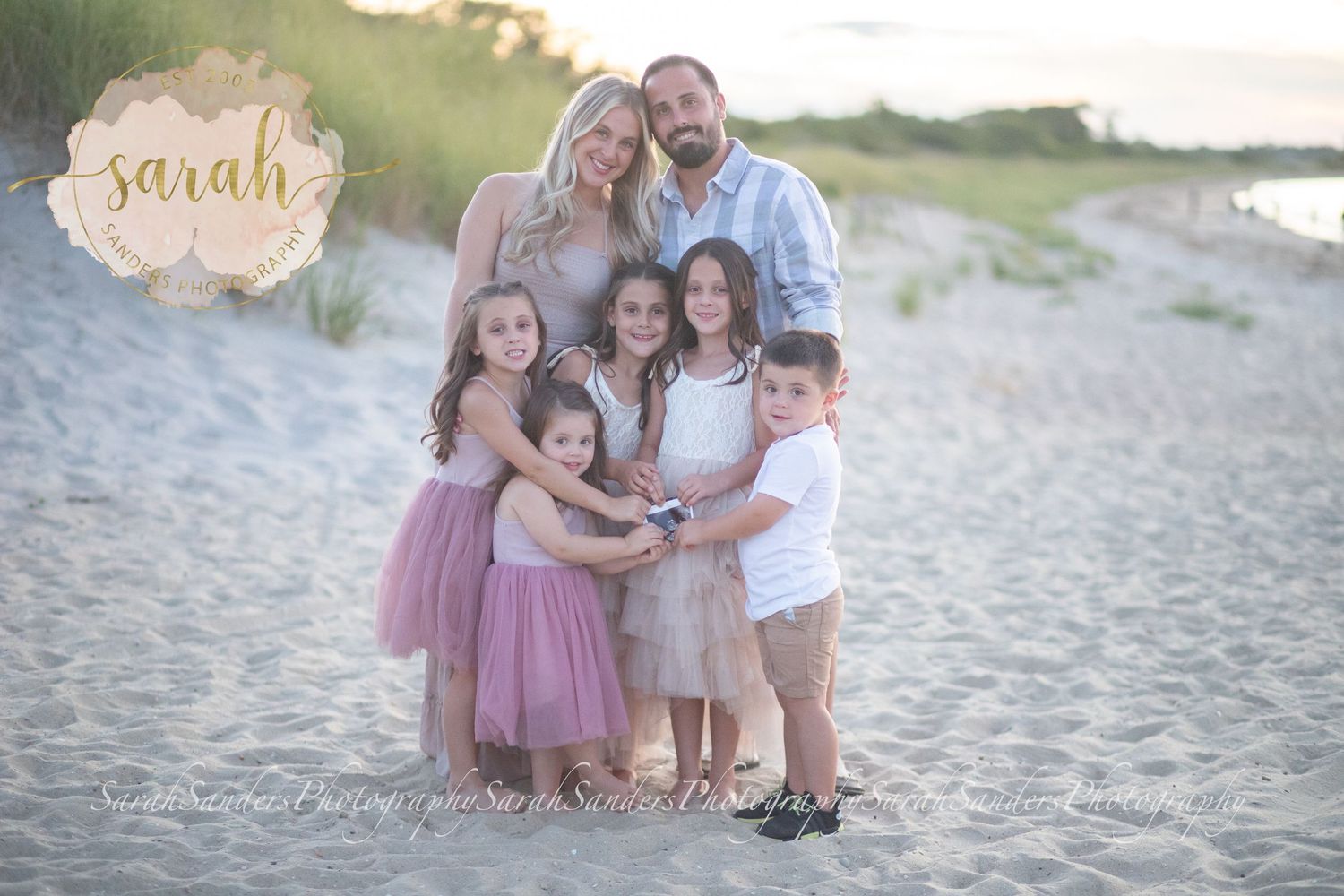 Family at the beach during sunset