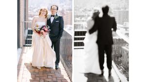 Wedding couple on balcony with artistic shadow silhouette against urban backdrop.