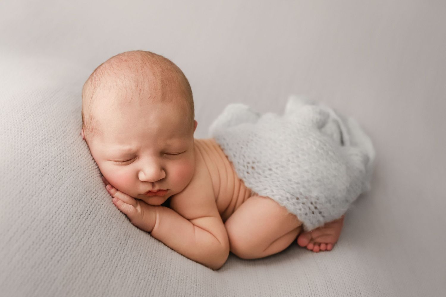 fine art posed newborn, newborn baby boy posed with wrap