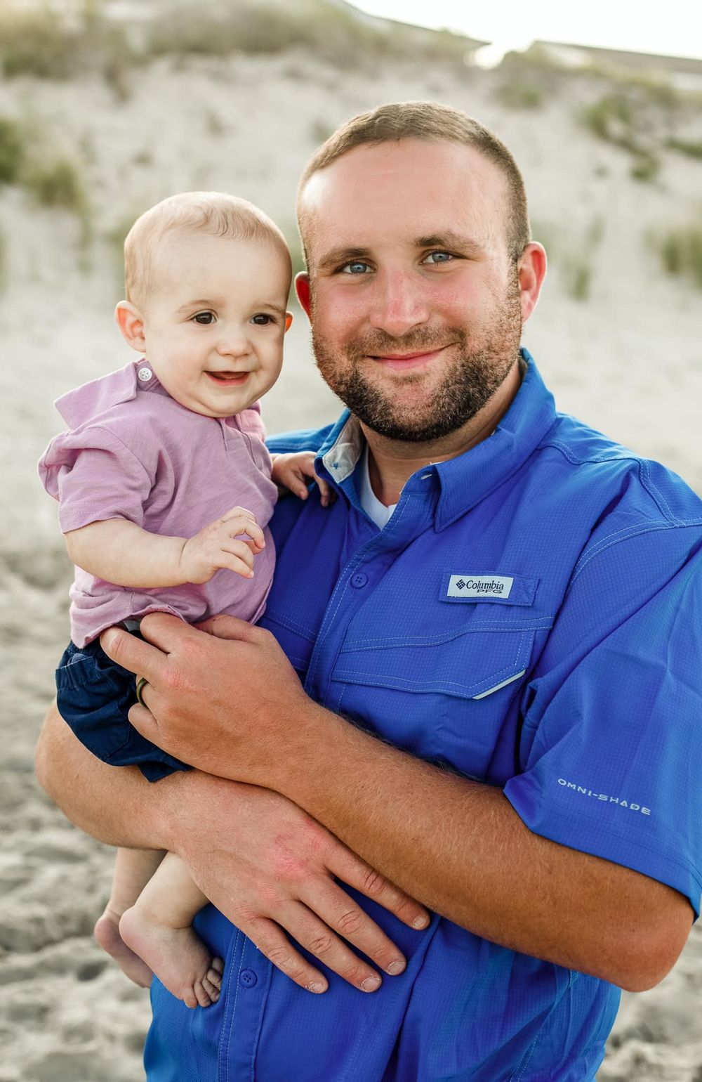 A series of candid beach photos showing tender moments in matching blue outfits.