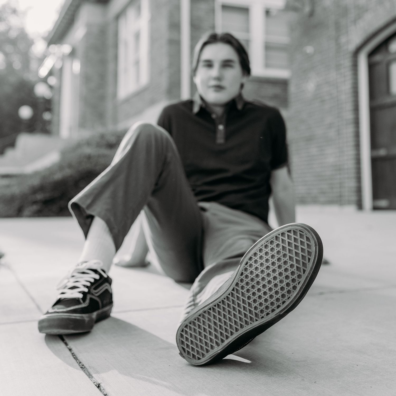 Black and white closed up of the bottom of a Vans skateboard shoe.