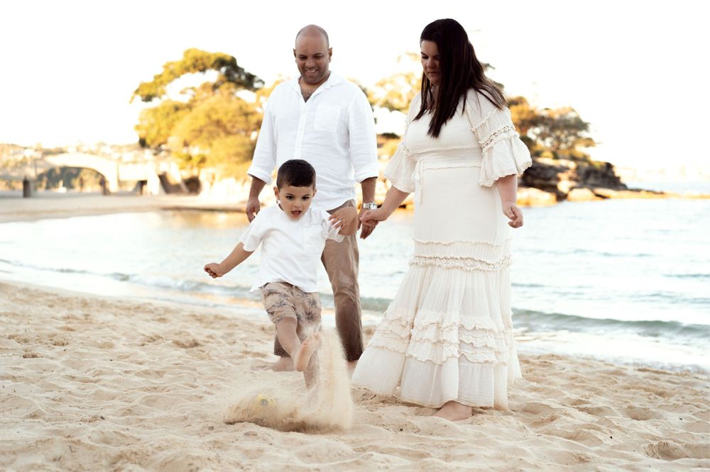 Toddler kicking ball at balmoral family photoshoot