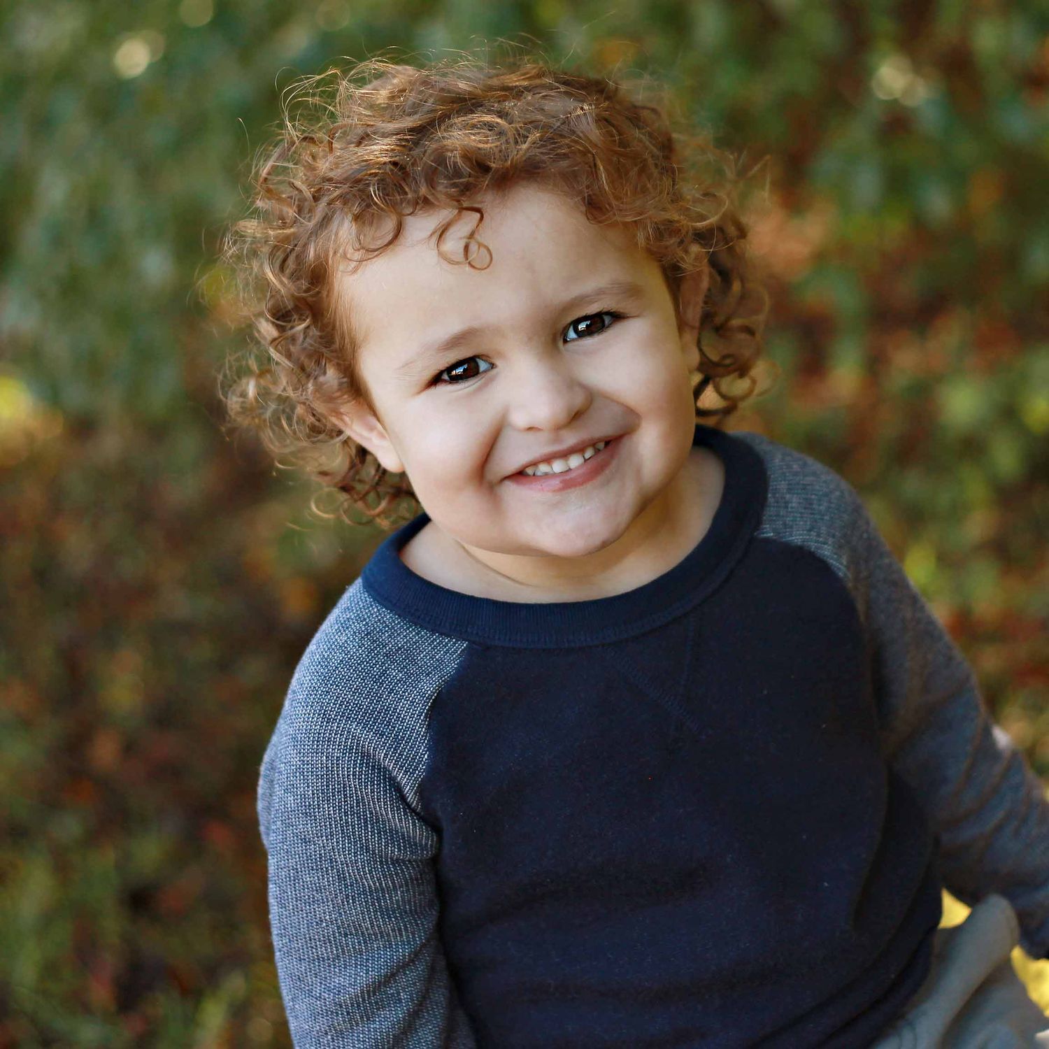 boy smiling for preschool photos by victoria leigh photography
