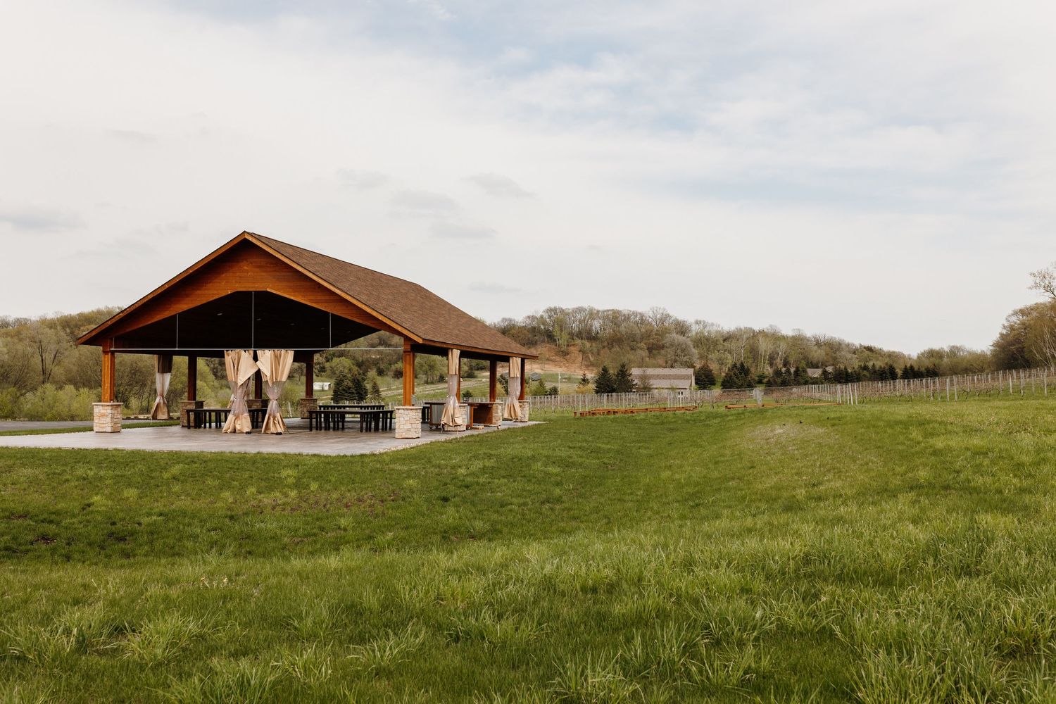 Overlooking the pavilion and vineyard at Belle Ame Wedding Venue in River Falls, Wisconsin