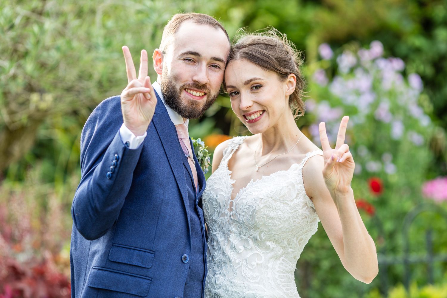 A Beautiful Smiling Bride and Groom getting Married at their Cooling Castle Barn Wedding in Kent