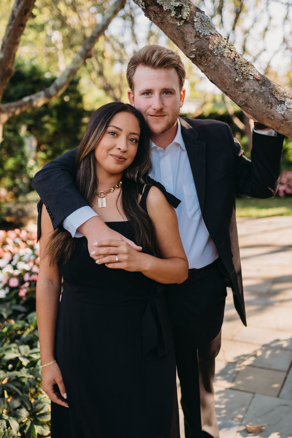 man and woman hold eachother during engagement photography session at the Inn at Little Washington