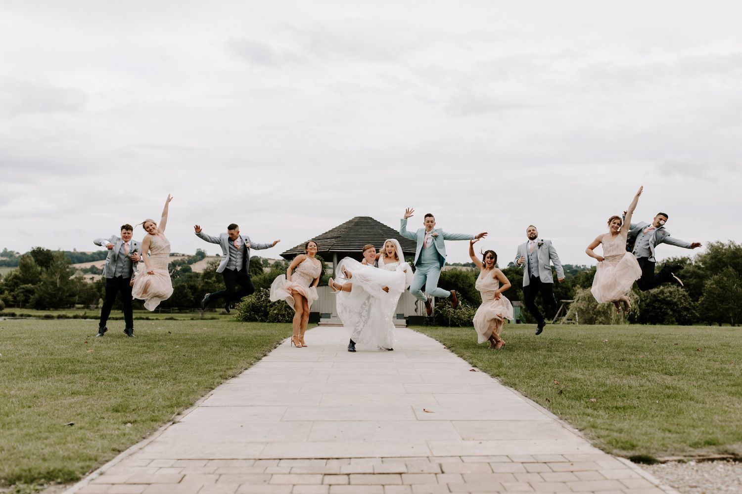 Yorkshire Wedding Barns, with jumping wedding party