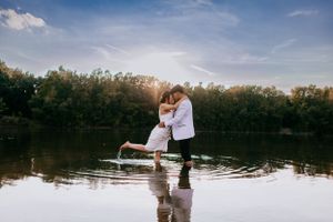 couple embrace in lake