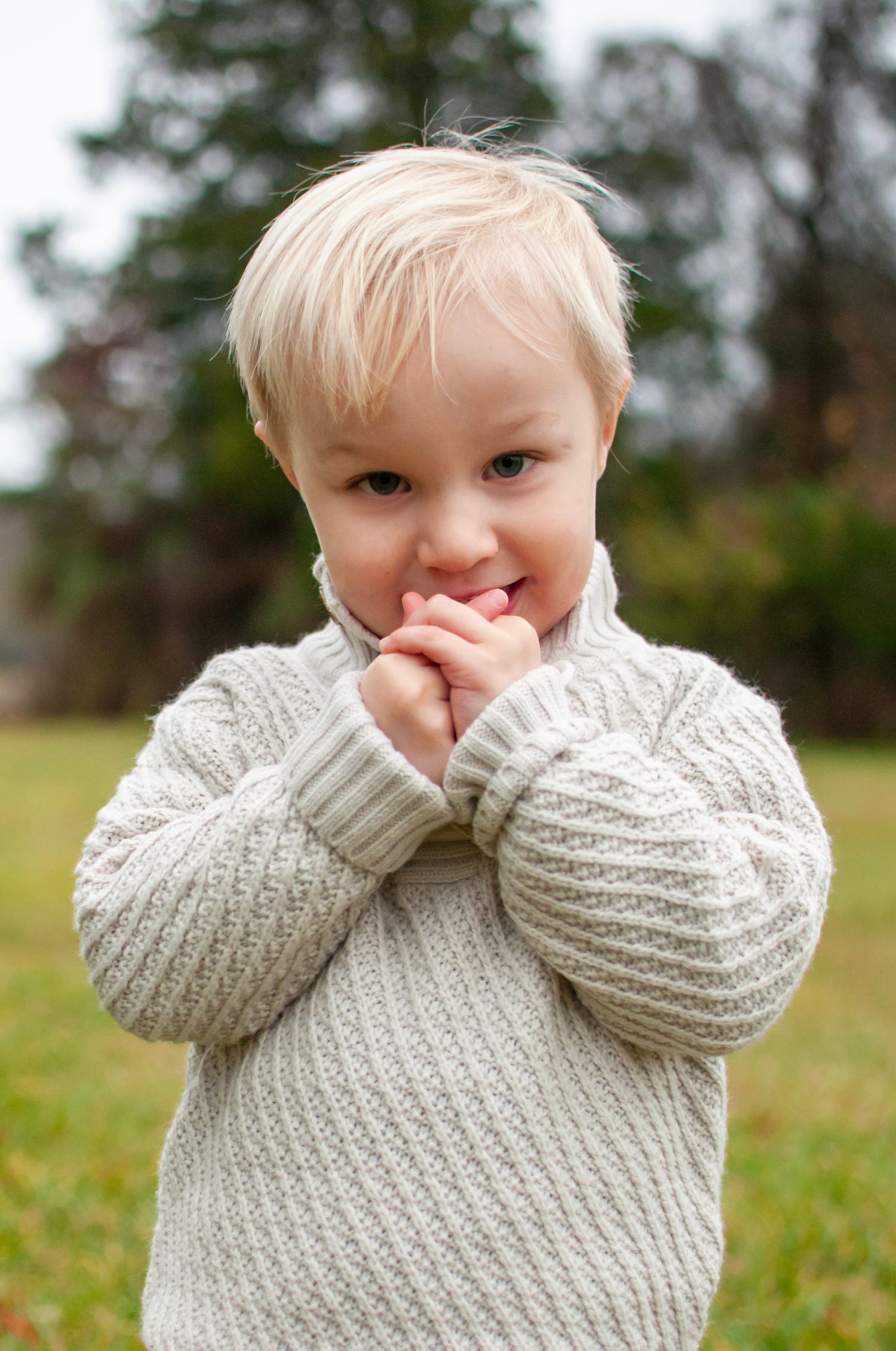 Little boy standing candid photo