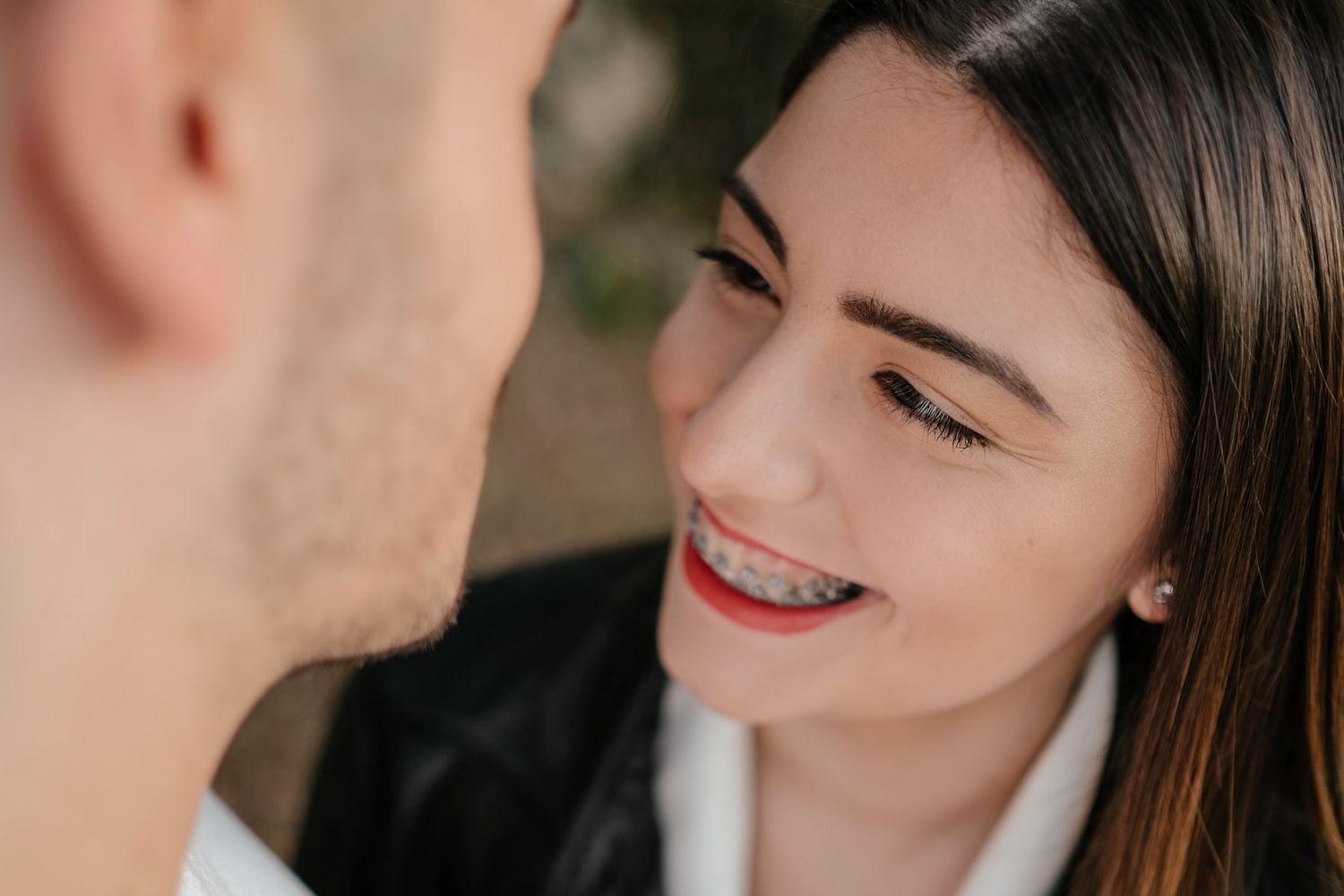 Close-up shot capturing an intimate moment with soft natural lighting.
