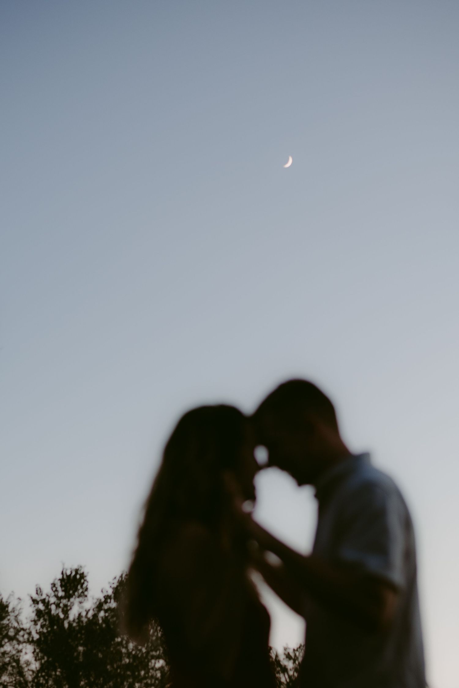 Katy Montoya Photography - Kenedy, Texas Photographer - Silhouette of Couple during family session in Luling, Texas