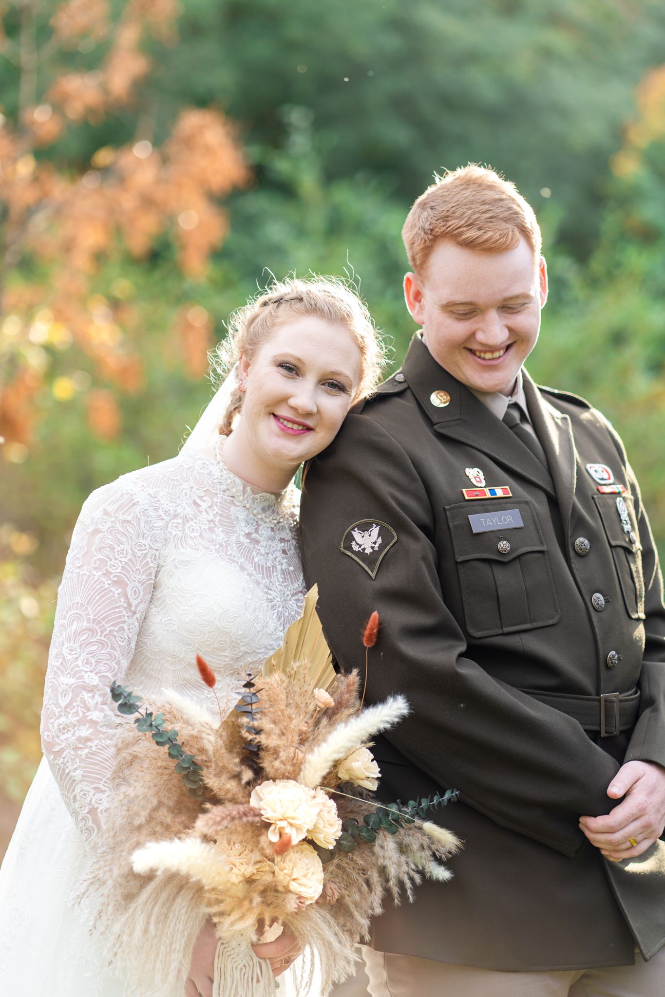 bride leans on groom's shoulder