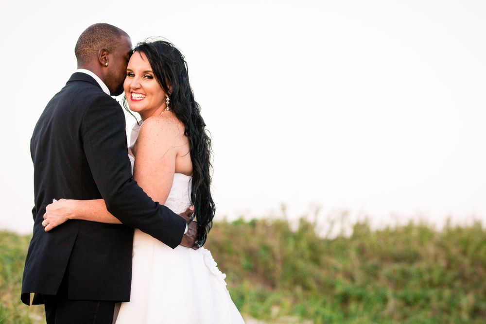 Interracial couple recently married at Fort Monroe located in Hampton, Virginia.