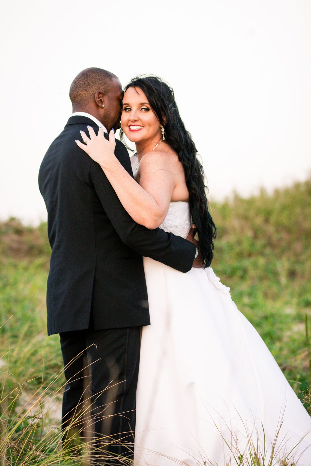 Interracial couple recently married at Fort Monroe located in Hampton, Virginia.