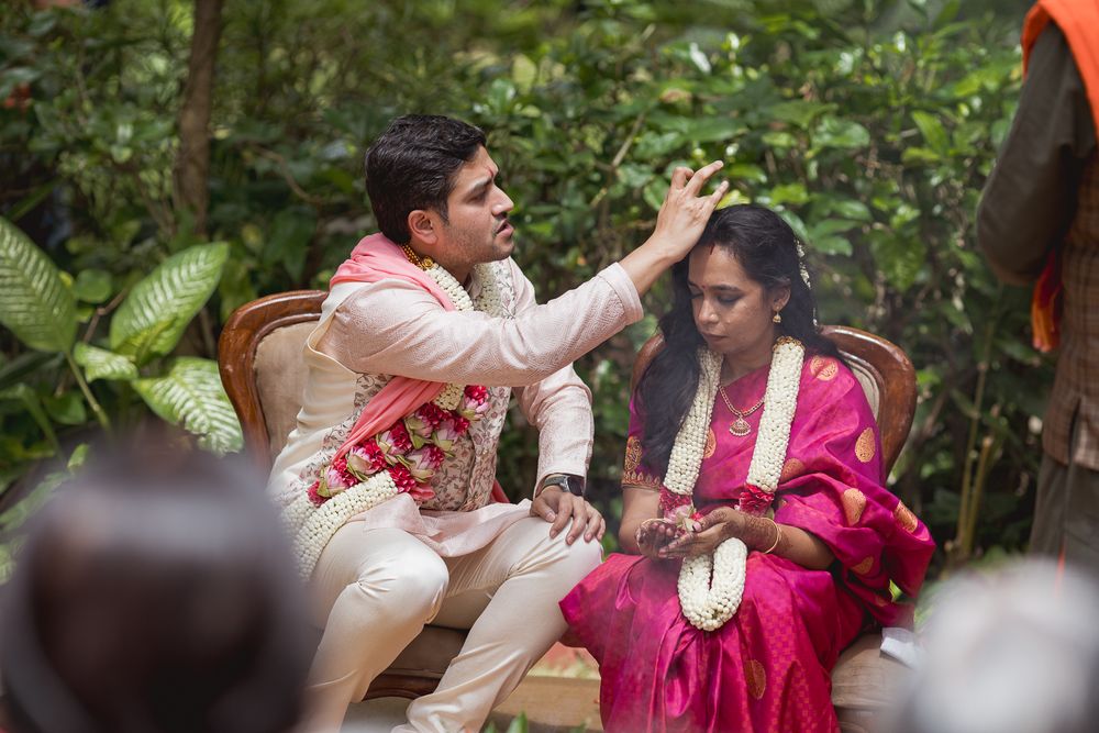A South Indian Bengali wedding with a pet cat at Taj West End, Bengaluru