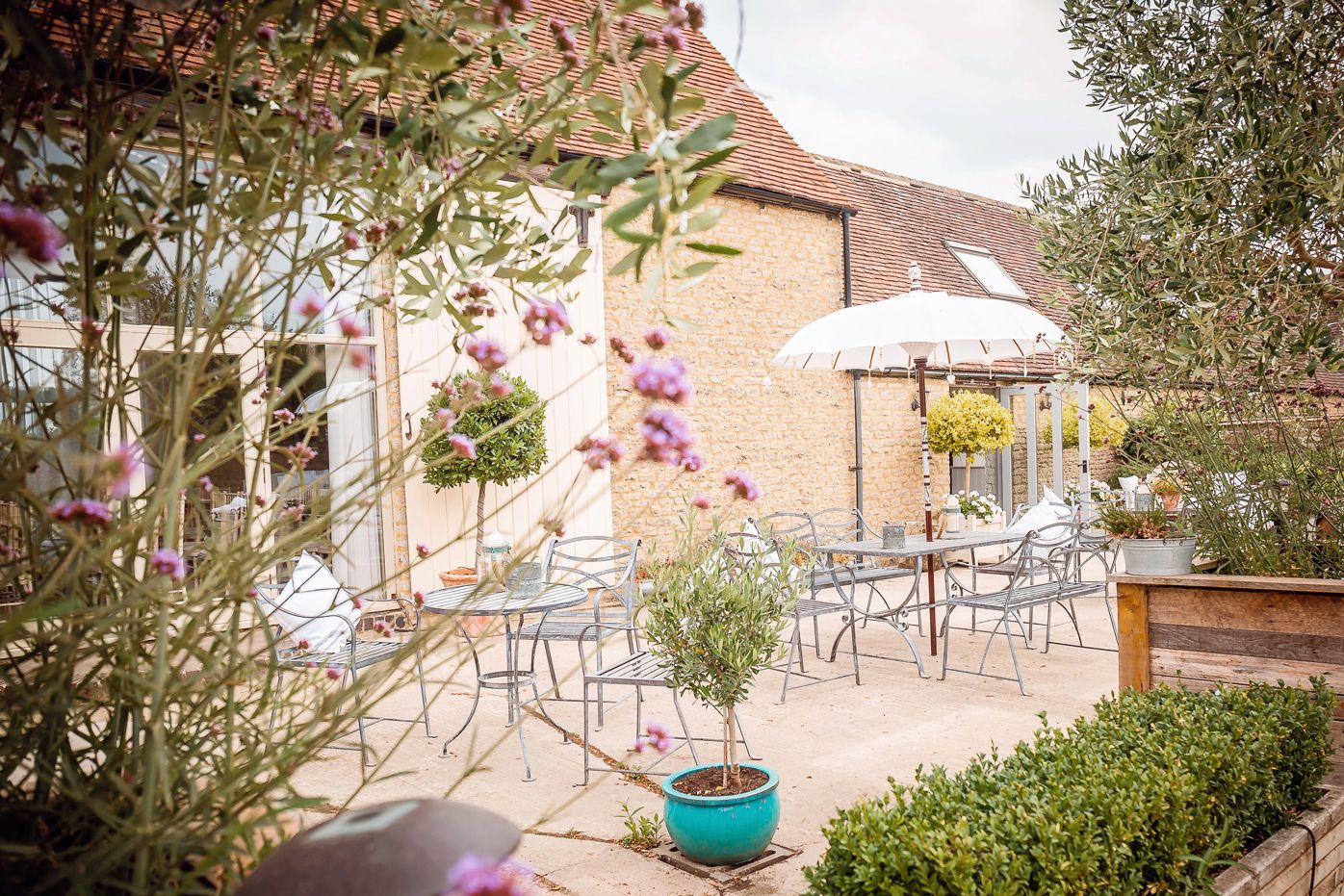 Pretty courtyard area for wedding guests to mingle