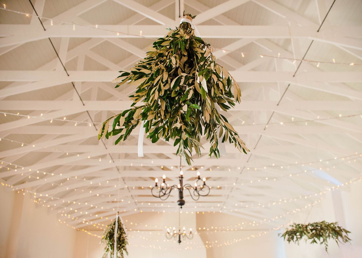 eucalyptus floral chandelier at wedding reception