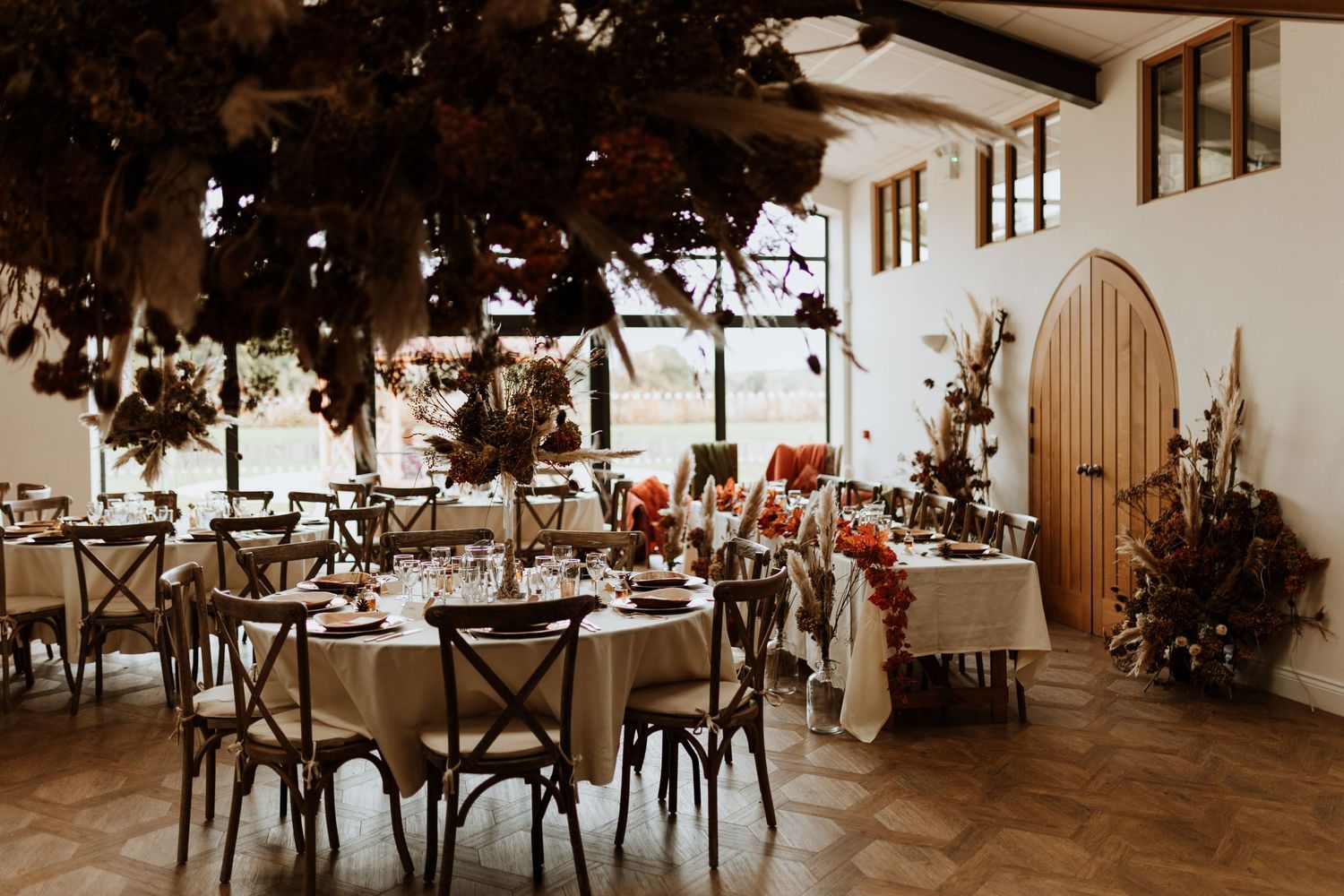 Rustic orange and brown maple leaf decor with hanging cloud for wedding