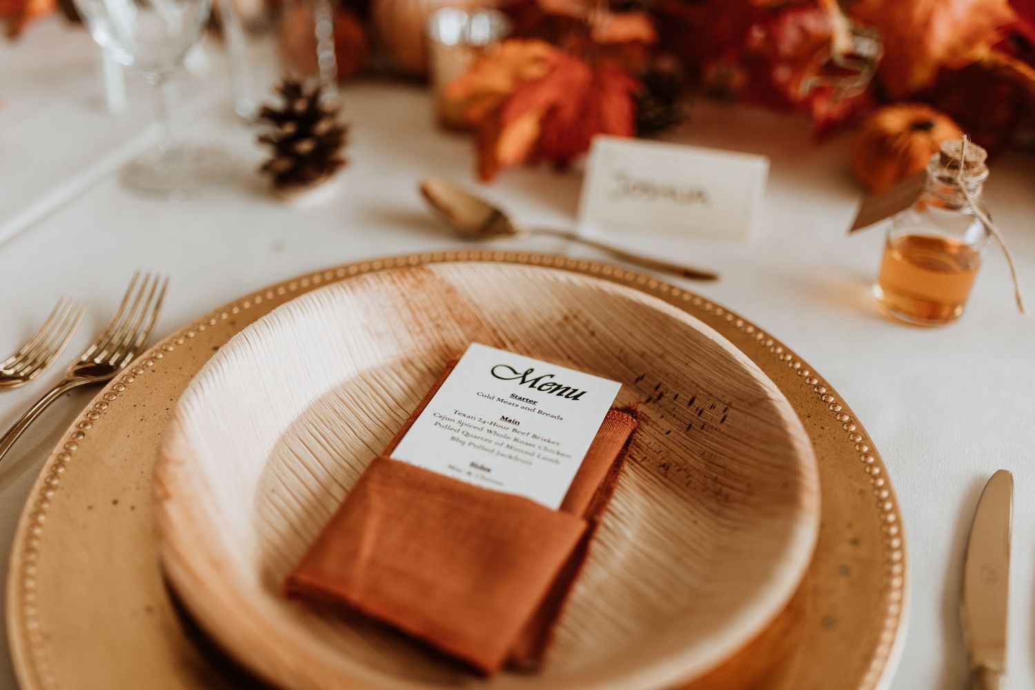 Orange linen napkins for wedding breakfast