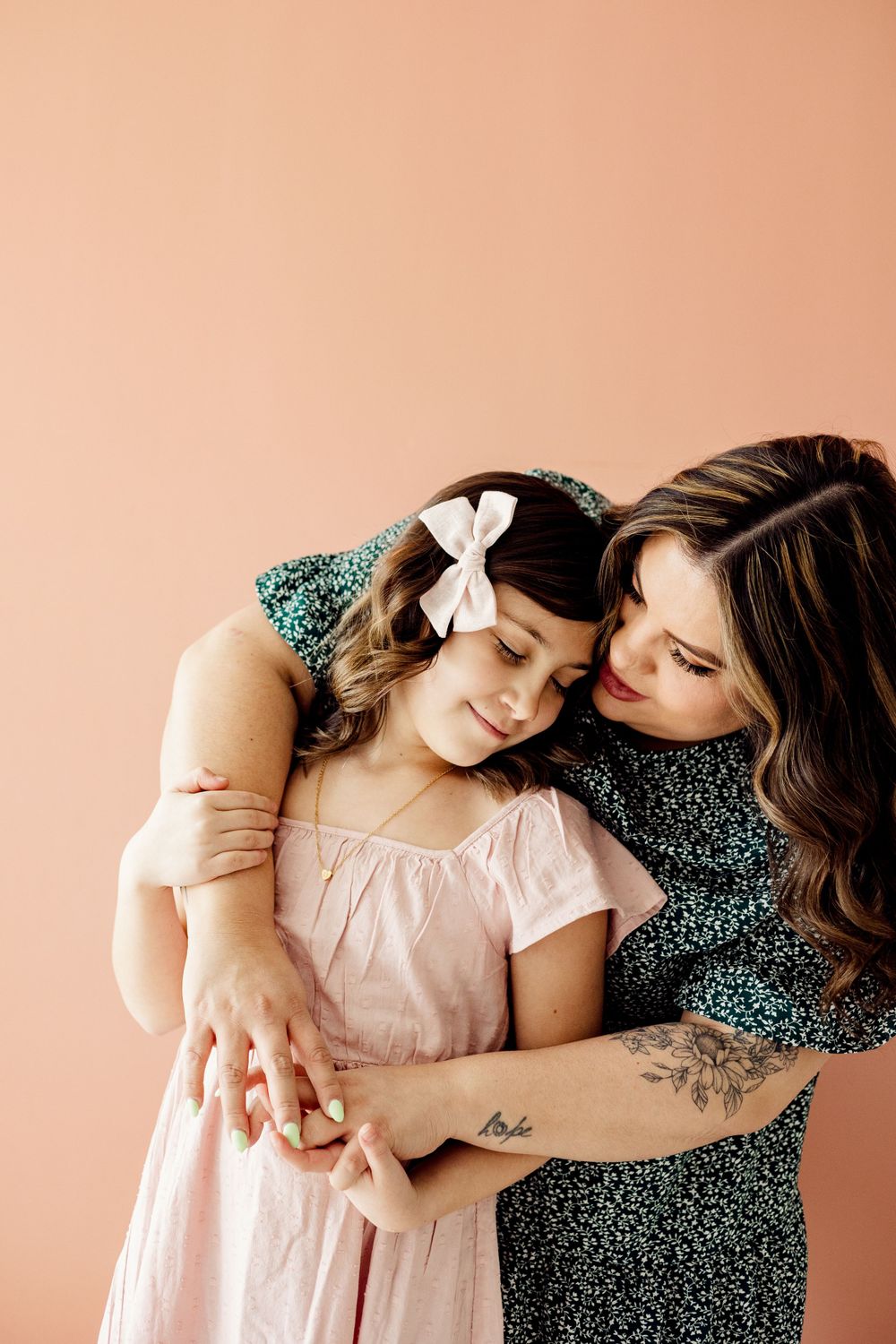 gentle hug between missouri mom and daughter