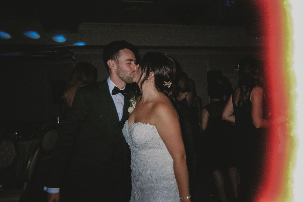 A dreamy dance moment captured at an evening wedding reception.