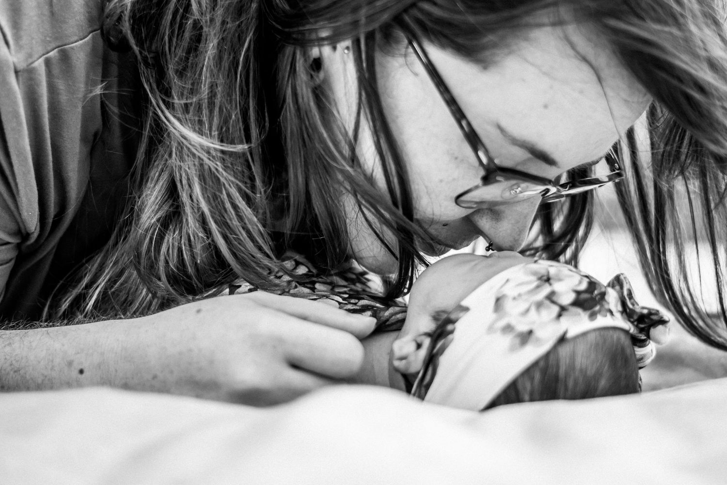 detail shot of a mother and her newborn baby