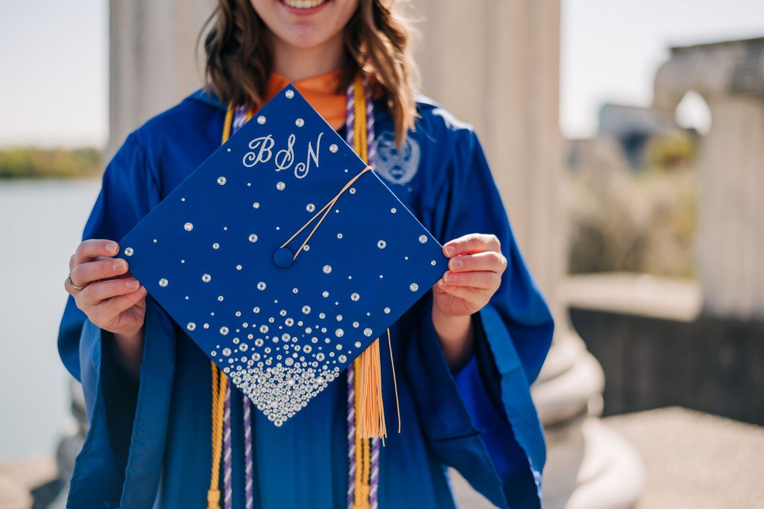 Blue graduation cap that says BSN on the top