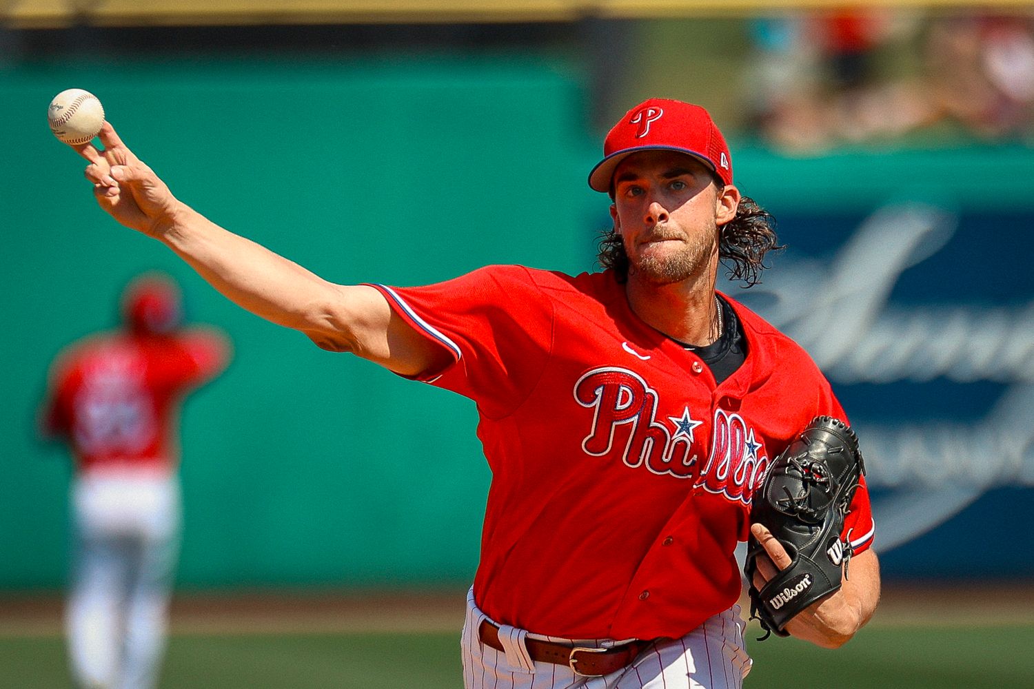 Aaron Nola, a Philadelphia Phillies player, pitching in MLB Spring Training 2023.