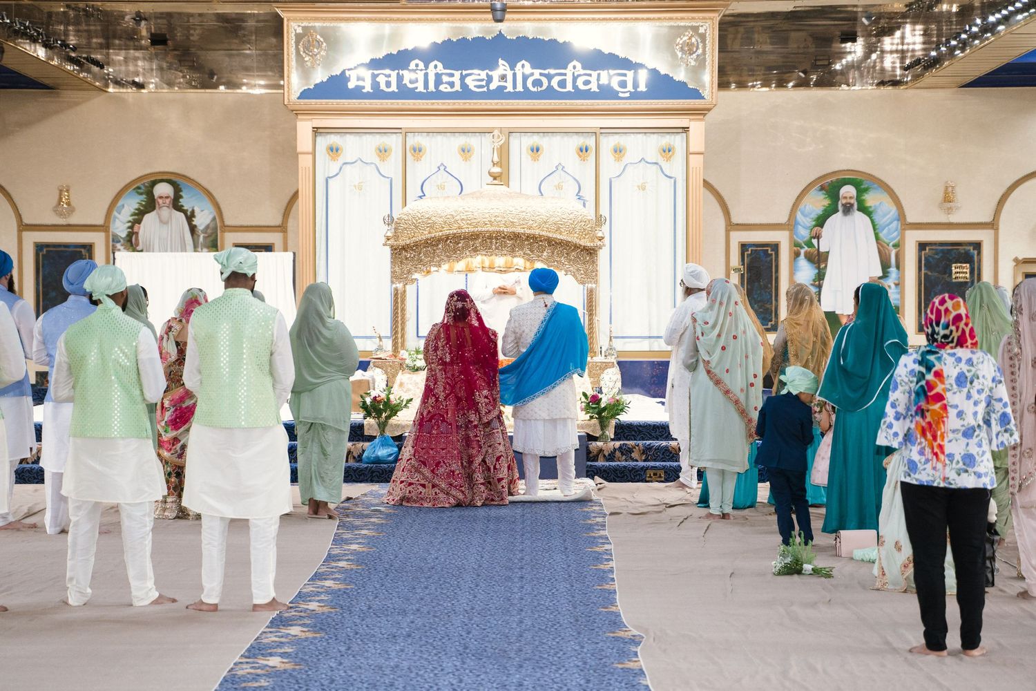 Sikh Couple at the Gurdwara taking blessing
