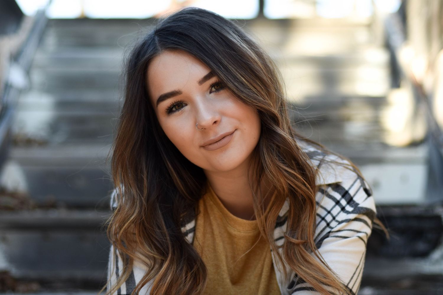 Girl modeling on a staircase